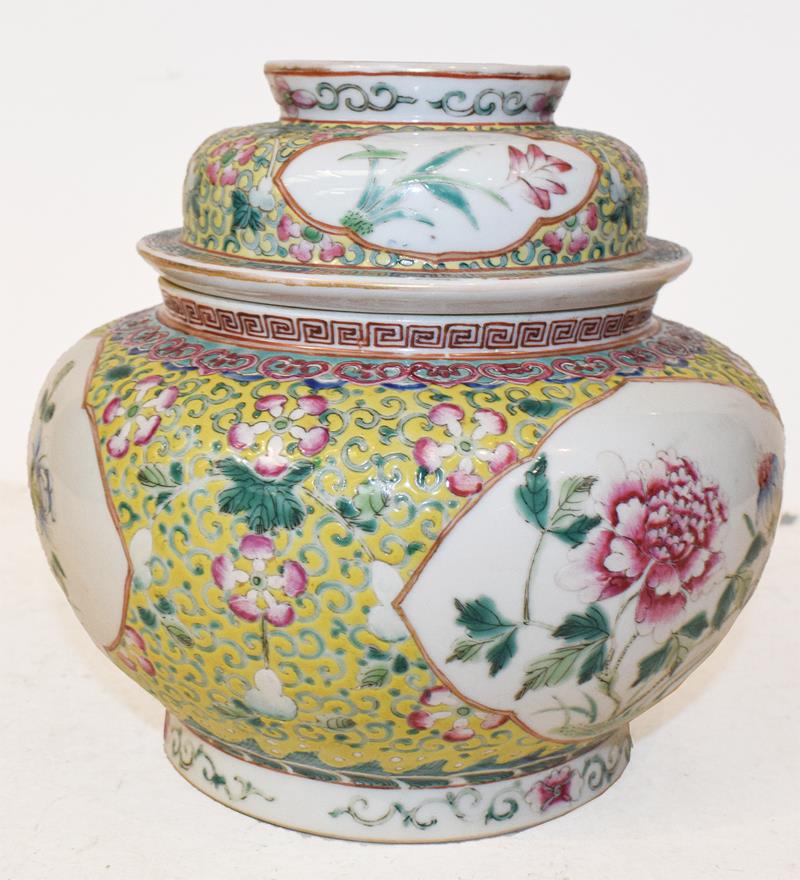 A 19th century Chinese famille rose bowl and cover, yellow ground with lotus scrolls and having - Image 3 of 7