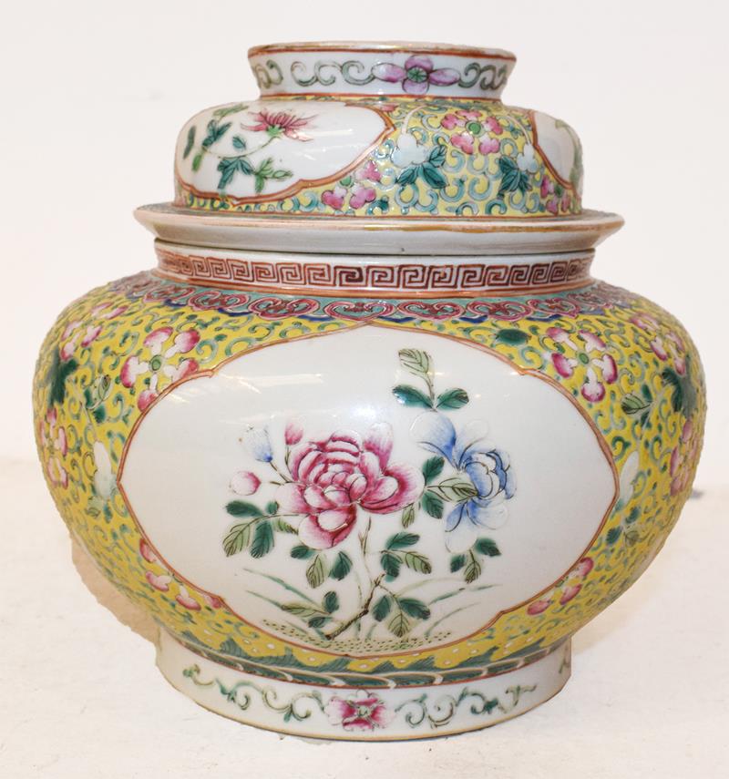 A 19th century Chinese famille rose bowl and cover, yellow ground with lotus scrolls and having - Image 2 of 7