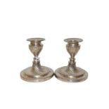 A pair of Victorian silver candlesticks, by Hawksworth, Eyre and Co, Sheffield, 1899, spirally-