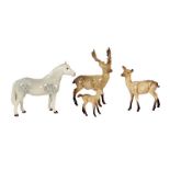Beswick Connemara pony, grey gloss together with Beswick stag, doe and fawn (a.f.) (4) . Connemara