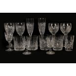 A part suite of cut glassware probably Webb, comprising twelve champagne flutes, six red wines,