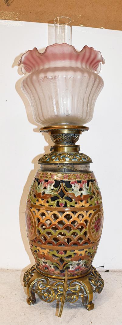 A reticulated pottery based oil lamp, probably Zsolnay, a cut glass table lamp, a large lamp with - Image 6 of 12