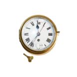 A brass cased ships bulkhead timepiece with centre seconds and enamel dial, 24cm dia.