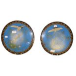 A pair of Japanese Meiji period cloisonne chargers, with blue ground decorated with cranes and