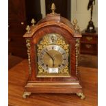 An oak cased quarter mantle clock, circa 1890, 41cm high, striking on two gongs movement back plated