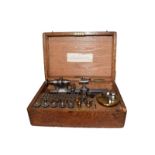 A TCM Co Ltd London watchmakers lathe with collets, in wooden box