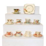 A group of Art Deco coffee cans and saucers (three trays)