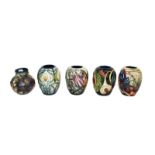 Five modern Moorcroft vases, Castle Garden, 9.5cm, Hellebore, 8.5cm, Queen's Choice, 9.5cm,