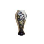 A modern Moorcroft bramble pattern vase, designed by Sally Tuffin, 28cm