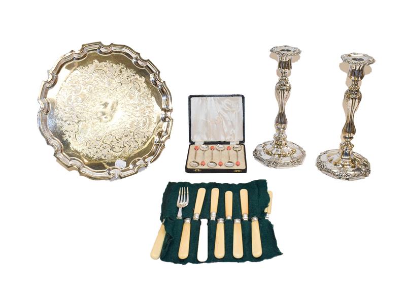 A collection of assorted silver plate comprising a pair of candlesticks, a salver and various