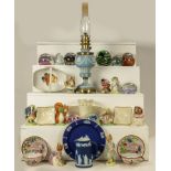 A 19th century pale blue Jasperware oil lamp, a quantity of various paperweights by Caithness and