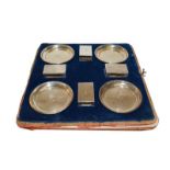 A set of four match box holders and four ashtrays, William Comyns, London 1929, engraved with the