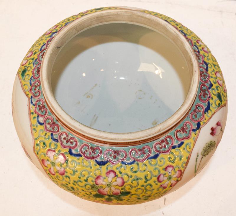 A 19th century Chinese famille rose bowl and cover, yellow ground with lotus scrolls and having - Image 6 of 7