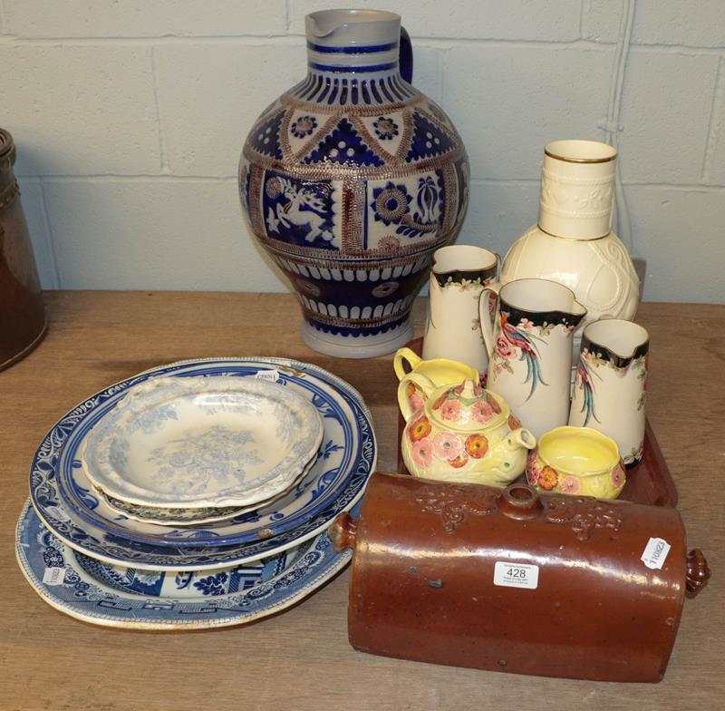 A large Westerwald stoneware jug and a quantity of ceramics including a Spanish faience charger,