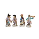 A set of four Volksted monkey band figures in the Meissen style (4)