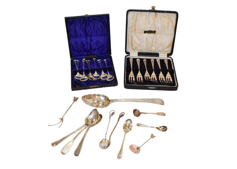 A collection of assorted flatware including a cased set of cake forks, a George III silver table