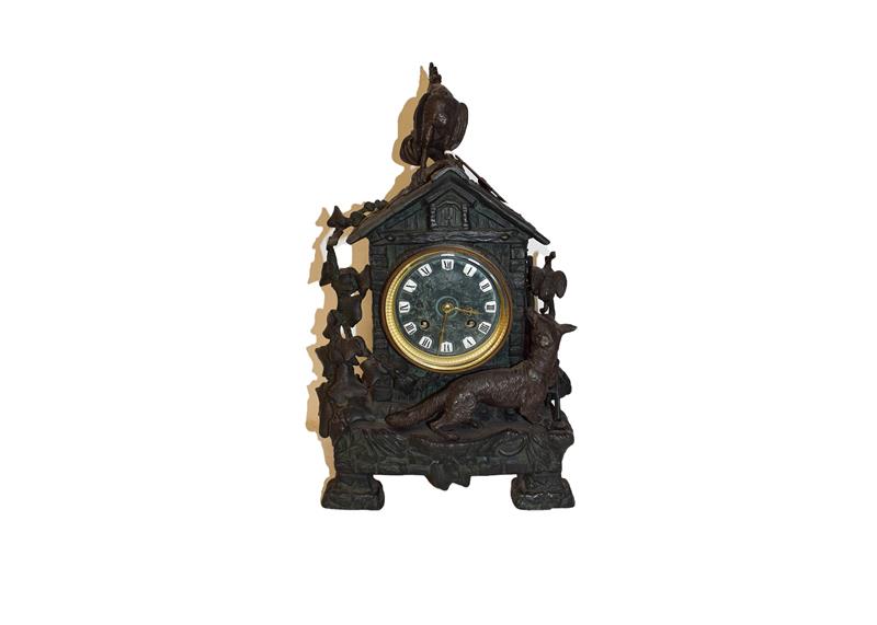 A 19th century Continental bronzed spelter mantel clock, the case modelled as a chicken coop