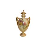A Royal Worcester blush ivory vase and cover painted with summer flowers to the front and reverse of