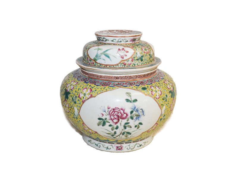 A 19th century Chinese famille rose bowl and cover, yellow ground with lotus scrolls and having