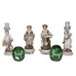 A pair of German 19th century figural porcelain candle sticks, marks for Johansen Roth, another pair