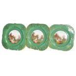 Three Royal Worcester plates with gilded and green ground edge the centre painted with cottage