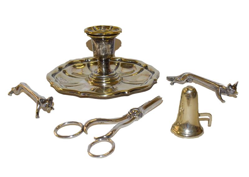 A silver plated chamber stick and snuffer together with with other plated wares (5)