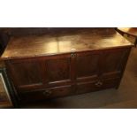 An early 18th century joined oak chest, the hinged lid above four moulded panels with two deep