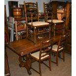 A Mellowcraft oak dining suite comprising dining table, six dining chairs, Welsh dresser and rack