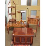 An Edwardian mahogany cake stand, a mahogany wine table, a mahogany side cabinet, a coffee table and