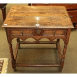 An 18th century oak single-drawer side table, 76cm by 57cm by 75cm
