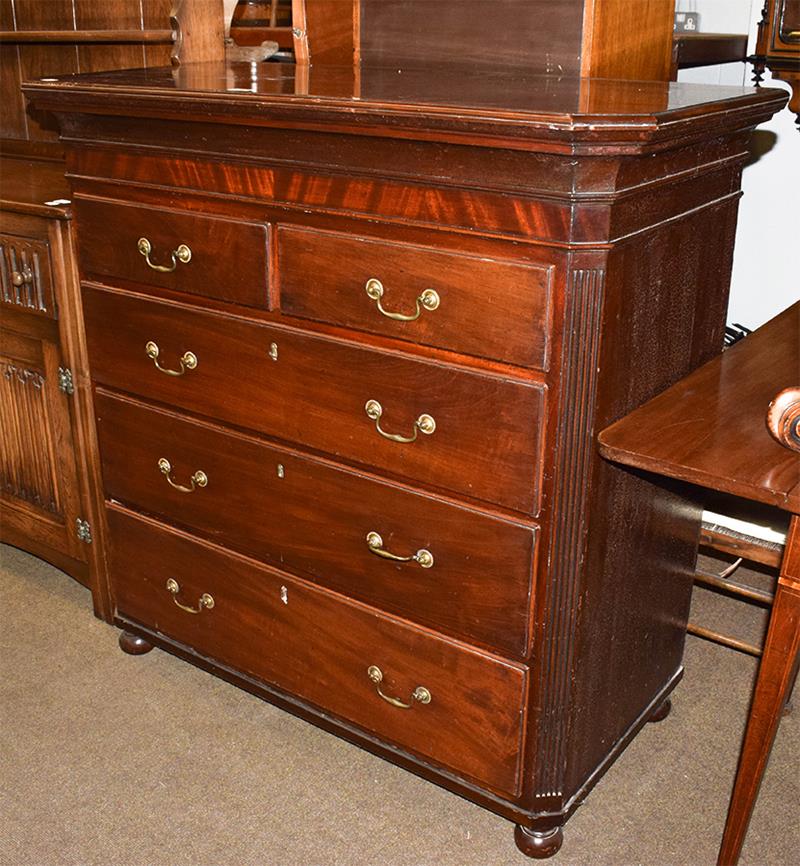 A Regency mahogany four-height chest of drawers with cantered corners with reeded mouldings and