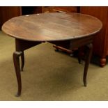 An 18th century oak drop leaf table, 125m by 110cm by 70cm