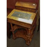 A Victorian figured walnut davenport with two lower supporting shelves and key, 53cm by 44cm by 98cm