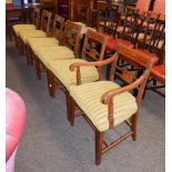 A set of six Regency inlaid mahogany dining chairs including a carver armchair (6)