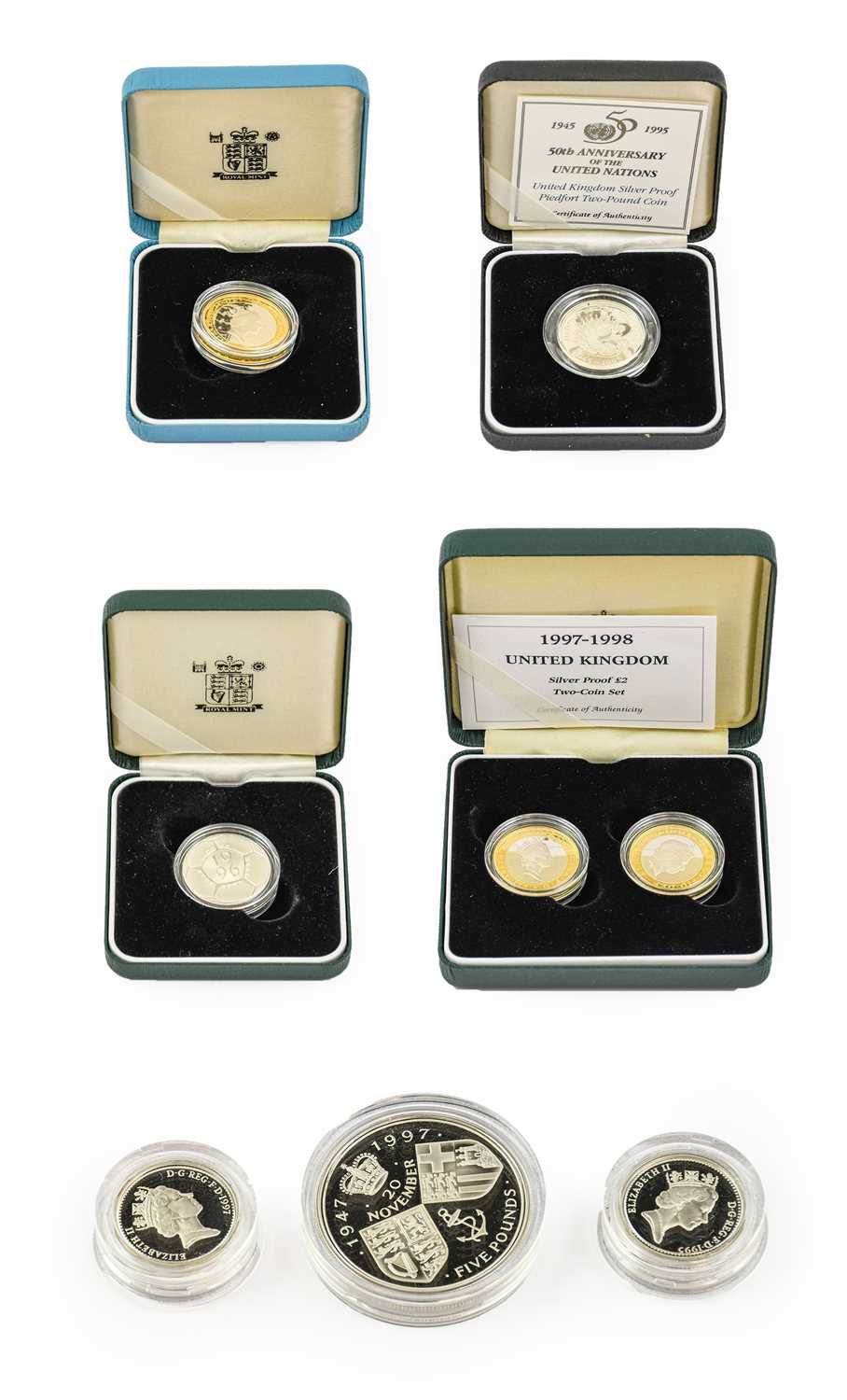 Elizabeth II, 8 x Sterling Silver Silver Proof Coins comprising: £5 1997 'Golden Wedding,' with