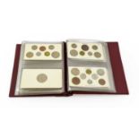 An Album Containing a Collection of 16 x Year Sets comprising: 1953(x2) each 9 coins farthing to