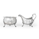 A George III Irish Silver Sauceboat and an Edward VII Silver Sugar-Bowl To Match, The Sauceboat by