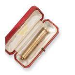 A George V Gold Propelling Container, by Cartier, London, Circa 1920, 9ct, the tubular container