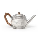 A George III Silver Teapot, by Solomon Hougham, London, 1799, oval bombe and with a vacant cartouche
