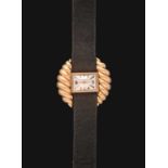 A Lady's 18ct Gold Back Winding Wristwatch with an Unusual Shell Form Case Sides, signed Jaeger