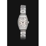A Lady's Stainless Steel Tonneau Shaped Diamond Set Wristwatch, signed Longines, model: Evidenza,