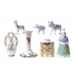 A quantity of Continental faience, mainly Rouen, including octagonal candlestick, inkwells,