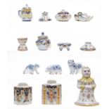 A quantity of Continental faience pottery, mainly Rouen polychrome wares including two tea jars, one