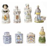 A collection of Continental faience pottery, mainly Rouen, including tea jars, desk stand, figural