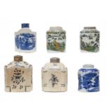 A collection of 18th century and later mainly English pottery tea jars, including a pair of