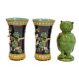 A pair of Victorian Holdcroft Majolica vases applied with birds and convolvulus (a.f); together with