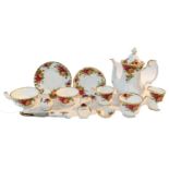 A collection of Nao and Lladro, Royal Albert tea service, Satsuma vase, two plates, bowl, pair of