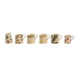 Emma Bridgewater, fifteen various coffee cups, a pair of small vases and one small decorative cup,
