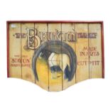A reproduction painted wooden advertising sign 'The Burlington Blanket', 82cm by 60cm