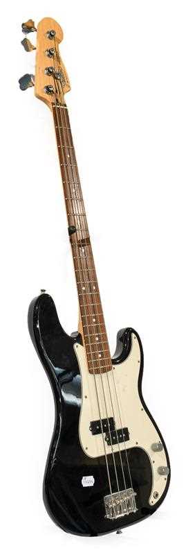 Copy Fender Precision Bass Guitar with decal 'Made in Mexico no.MZ3176091' black body, white